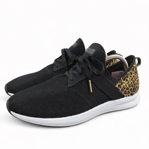 New Balance Leopard and black sneakers